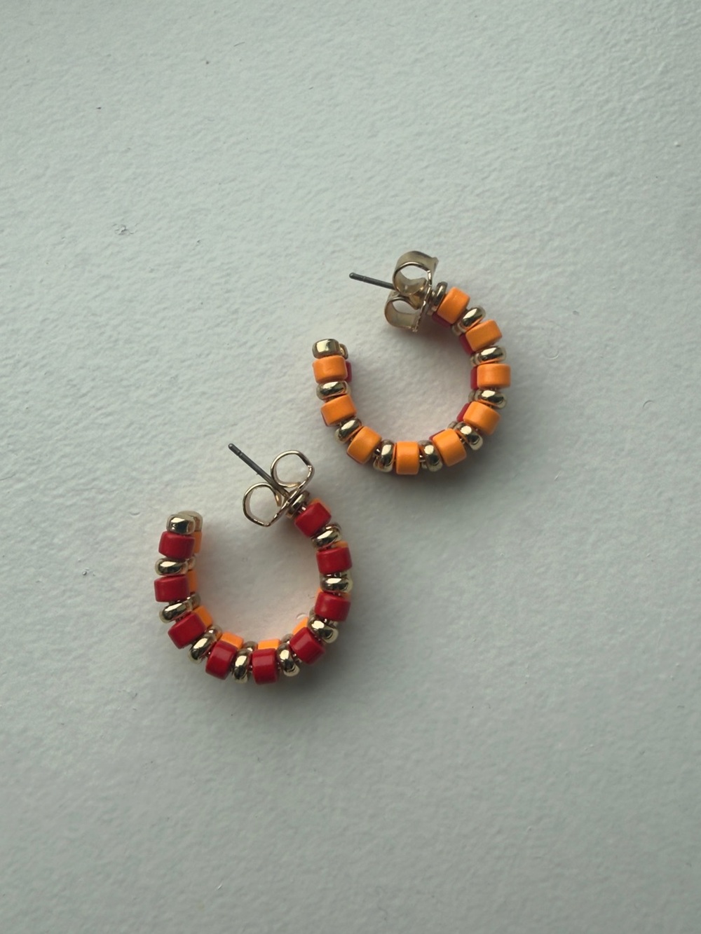 Roxanne Assoulin Gold Beaded Hoop Earrings with Red and Orange Accents